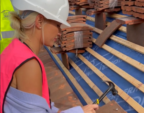 Billie Frairs Fitting Clay Roof Tiles on her new home